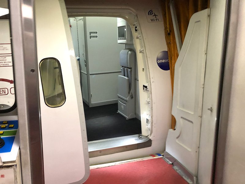 Stepping inside this Japan Airlines B787 Dreamliner for the next 10 hours.