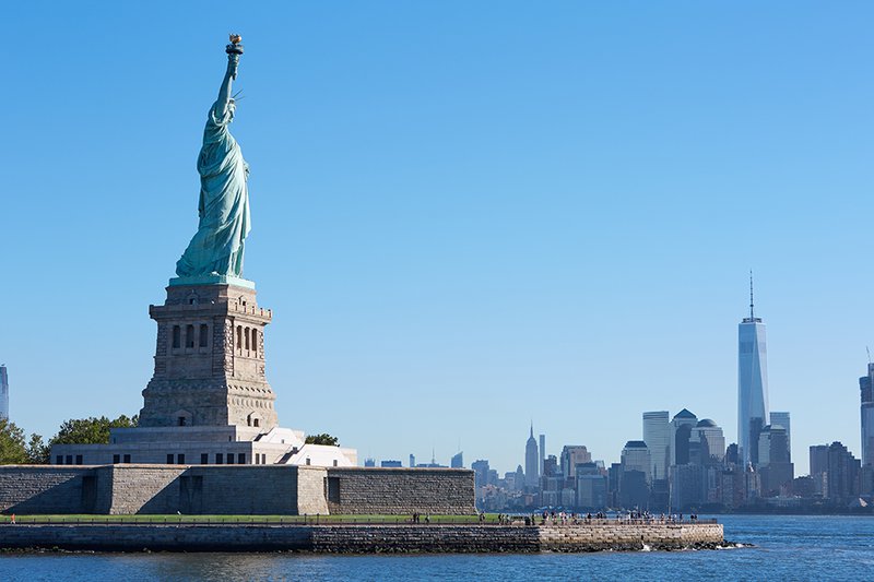 The Statue of Liberty and the skyscrapers of Manhattan.